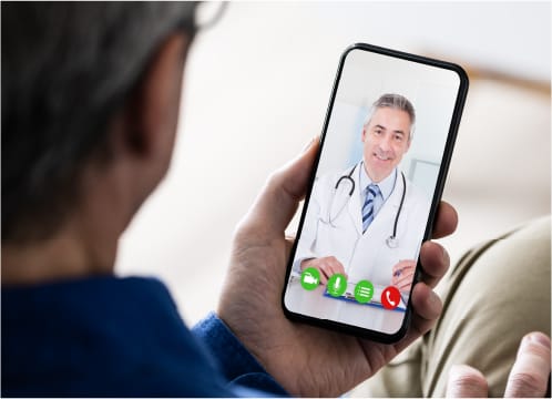 Telehealth patient on phone image